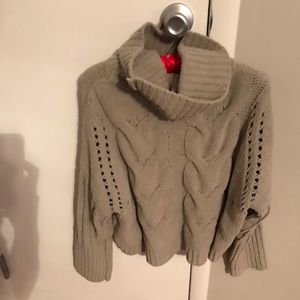 greenish grey sweater